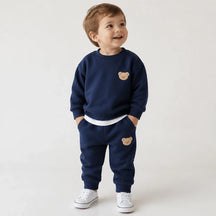 Conjunto de moletom infantil azul marinho em algodão macio, estilo esportivo, conforto e durabilidade para as brincadeiras