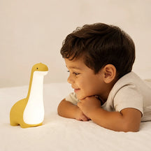 Luminária infantil dinossauro com luz suave e proteção ocular ideal para sono tranquilo e quarto aconchegante