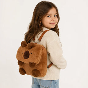 Mochila capivara de pelúcia macia infantil que abraça a criança e guarda tesouros com conforto