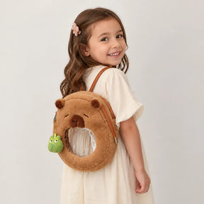 Mochila capivara de pelúcia macia infantil que abraça e protege os tesouros dos pequenos