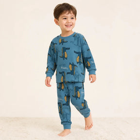 Conjunto de moletom infantil com estampa de dinossauro em algodão macio, confortável e seguro para as noites